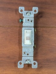 Leviton Toggle Framed Single Pole Quiet Switch White 15Amp 120V M24 1451-2WM