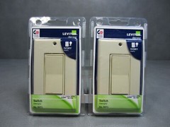 Pair of Leviton Decora 15a Ivory Switch with Plate 5671