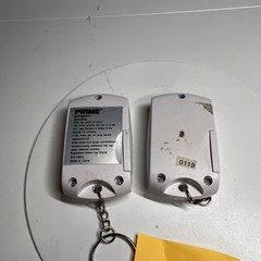 Two Prime UTTNRC21 White Wireless keychain Remote Control 419 and 119
