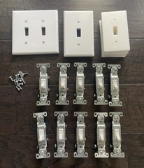 Eaton Single-pole Toggle Light Switch 15-Amp w/ Wall Plate & Sealer White